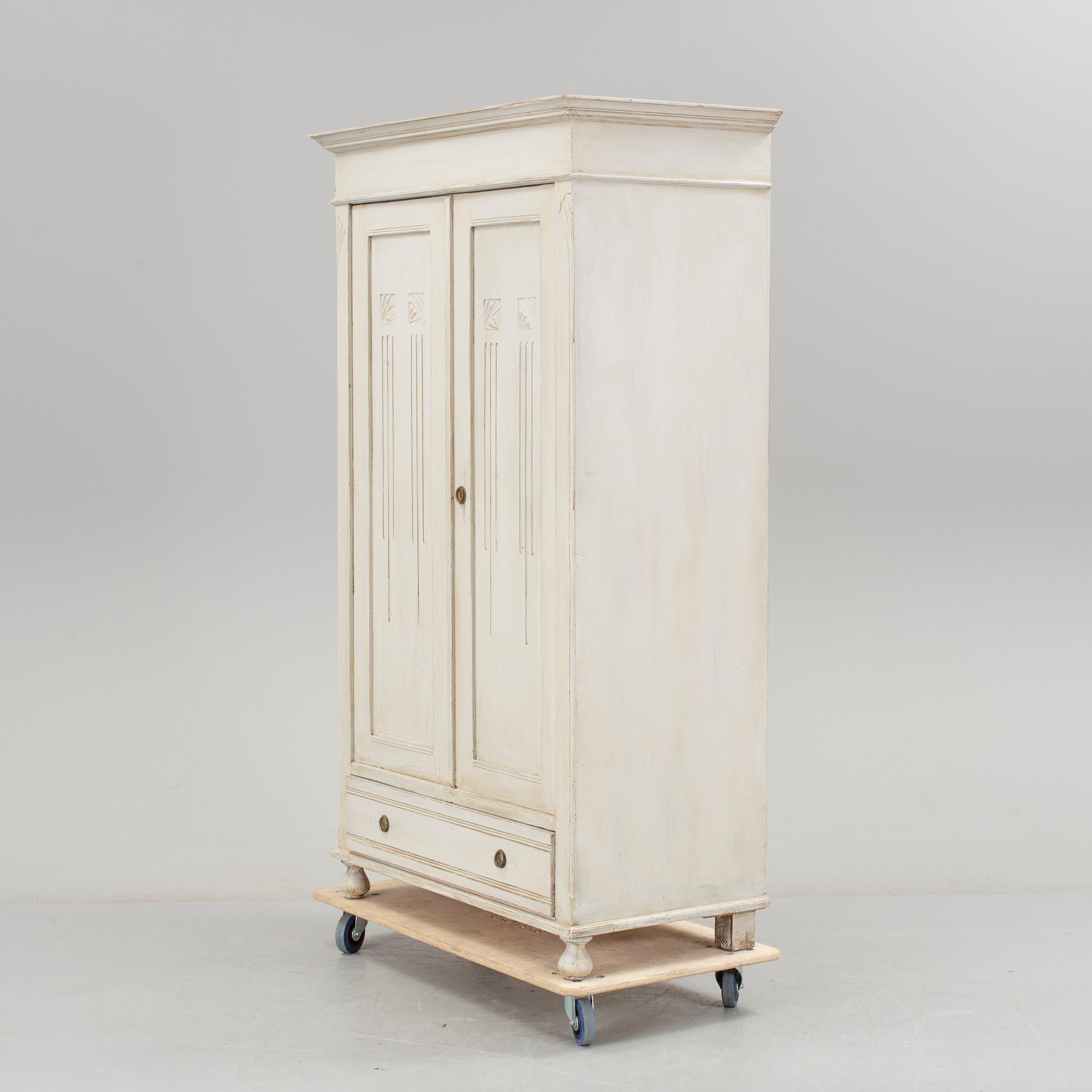 A wardrobe, circa 1900.