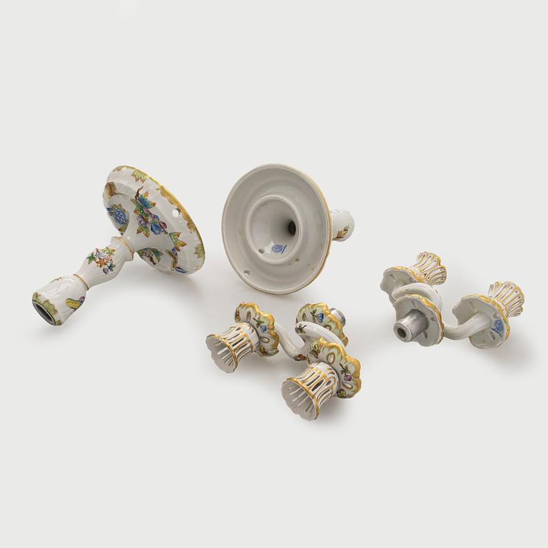 A pair of Herend porcelain candlesticks, and a lidded sugar bowl, Hungary.