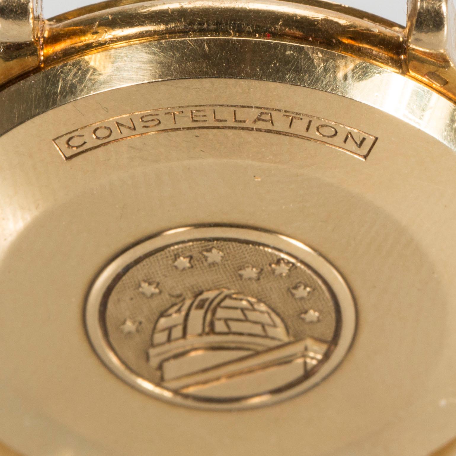 HERRARMBANDSUR, 18 K guld, Omega, Automatic Chronometer, Constellation, ca 1950-tal.