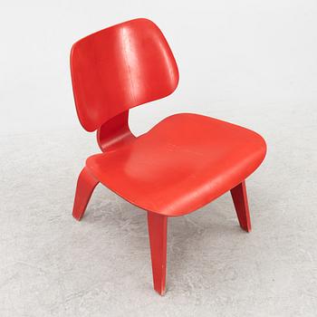 Charles & Ray Eames, a 'LCW' chair, Vitra, dated 2003.