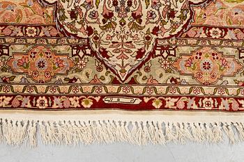 A rug, Old silk Hereke, ca 152 x 110 cm.