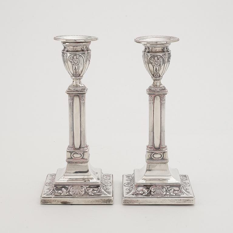 A pair of Edwardian silver candlesticks, London 1904, probably the mark of Thomas Bradbury & Sons (Turner Bradbury).