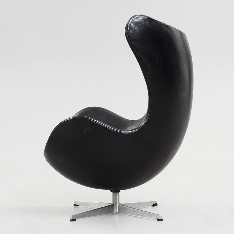 An Arne Jacobsen black leather 'Egg' chair, Fritz Hansen, Denmark 1960's.