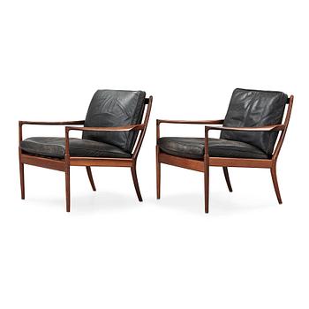 422. Ib Kofod Larsen, a pair of palisander and black leather 'Samsö' armchairs, 1960's, for Thysell's, Anderslöv, Sweden.