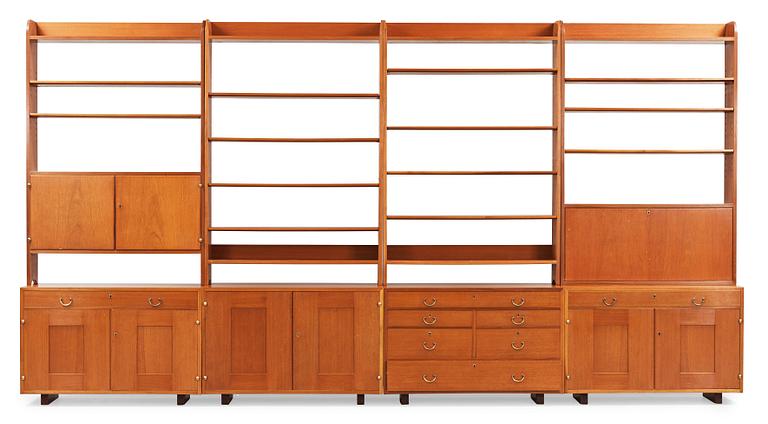 A set of four sections of Josef Frank mahogany bookshelves, model 2112, Svenskt Tenn.