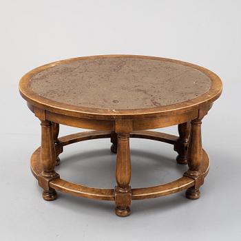 A stone top coffee table. First half of the 20th Century.