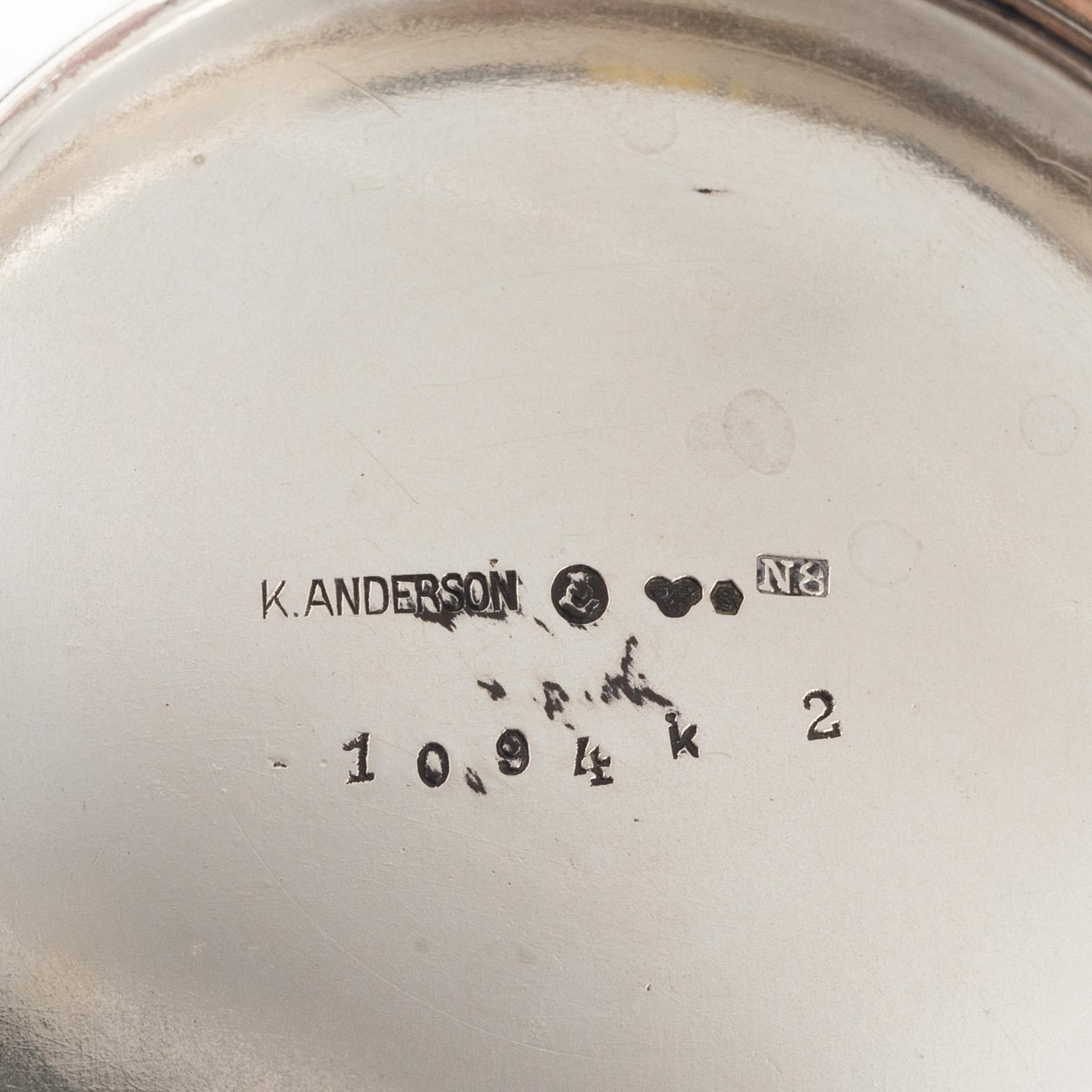 Three Silver Shakers and a Beaker.