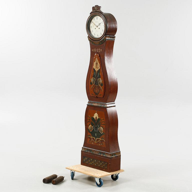 A grandfather clock dated 1823.