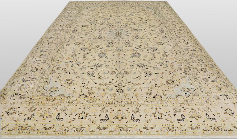 A Keshan carpet, 405 x 304 cm.