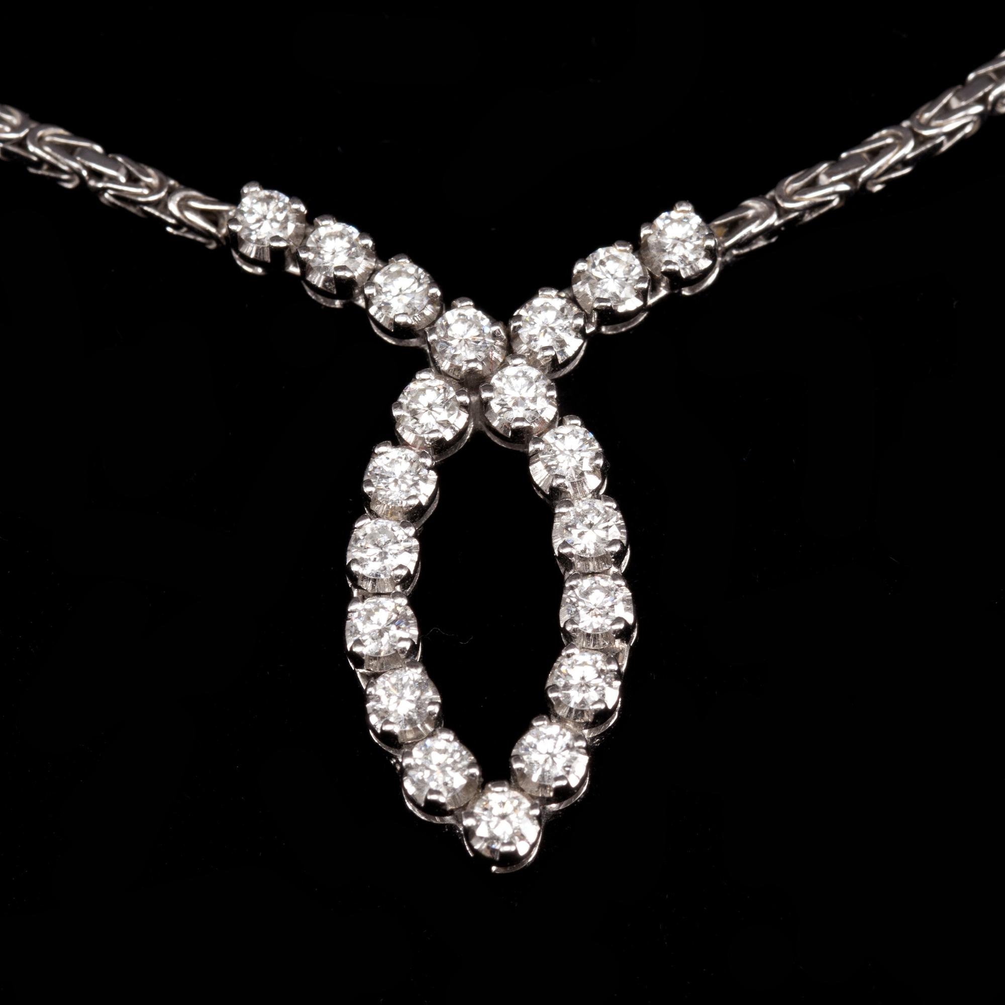 COLLIER, 18k vitguld med små diamanter tot ca 1 ct. Vikt 12 g.