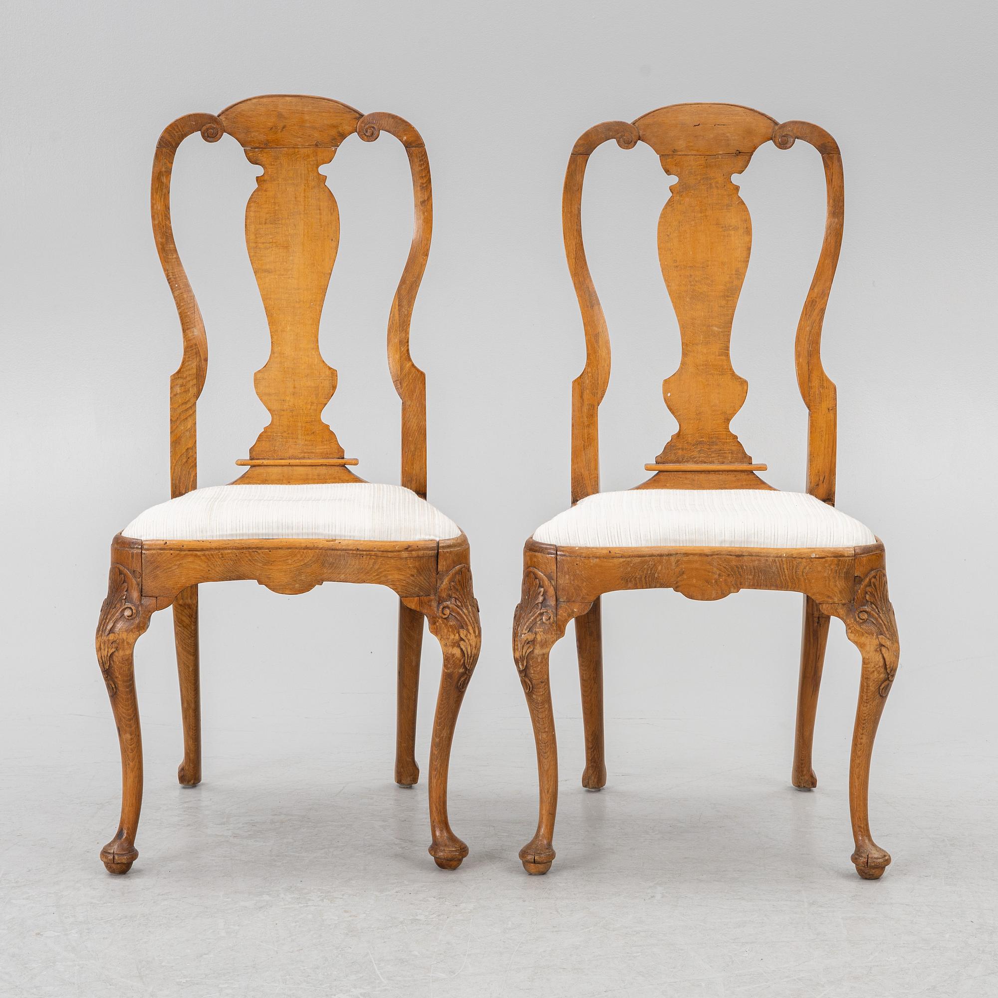 A pair of Swedish late baroque chairs, mid 18th century.
