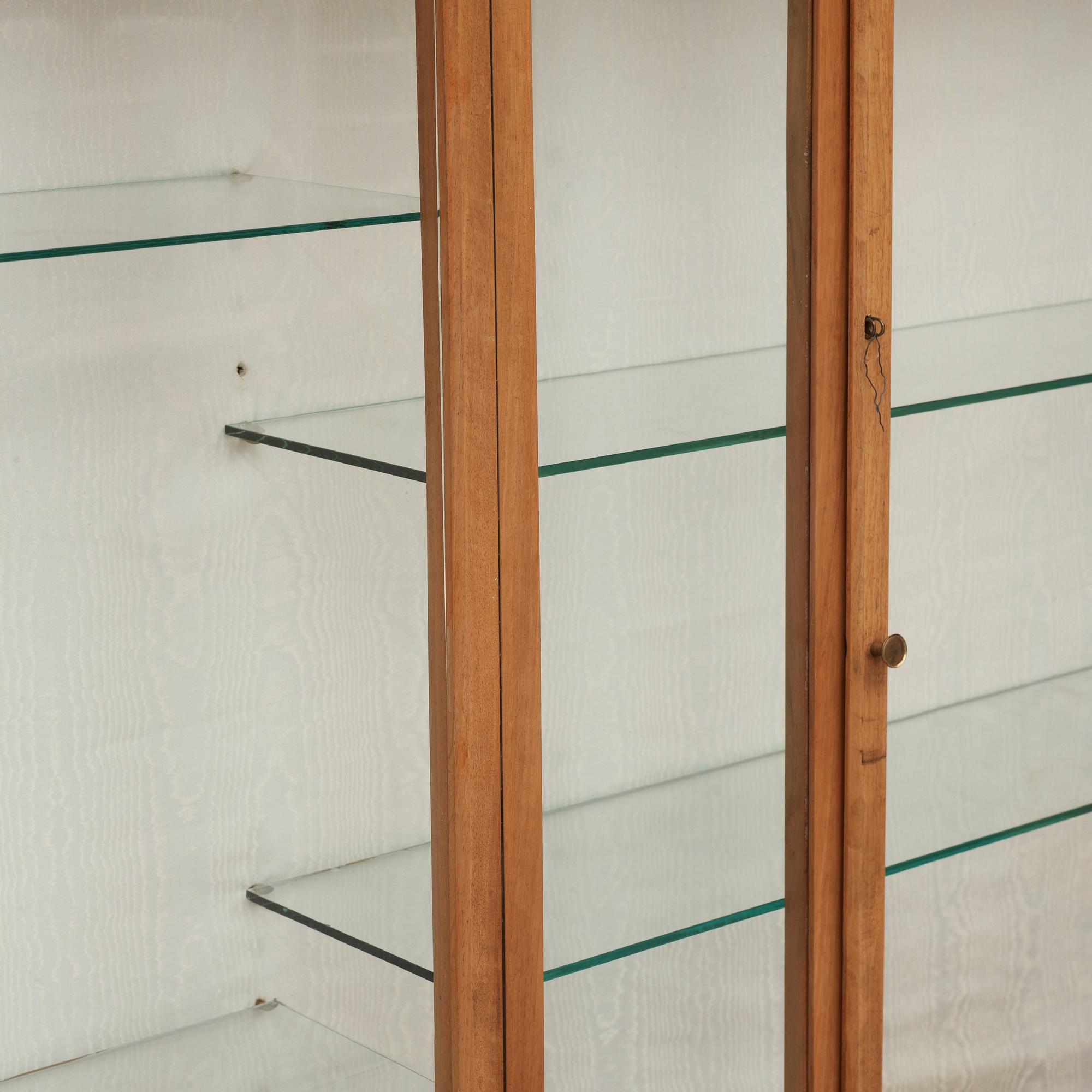 A Josef Frank mahogany showcase cabinet, a version of model 2077, by Svenskt Tenn.