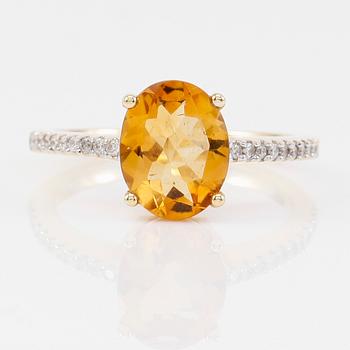RING, 18K guld, diamanter tot ca 0.16 ct. och citriner tot ca 2.12 ct.