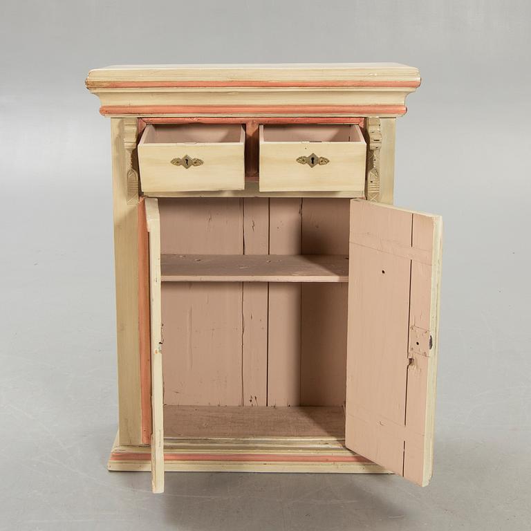 An 18th century painted cabinet.
