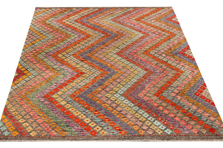 A Kilim carpet, c. 296 x 211 cm.