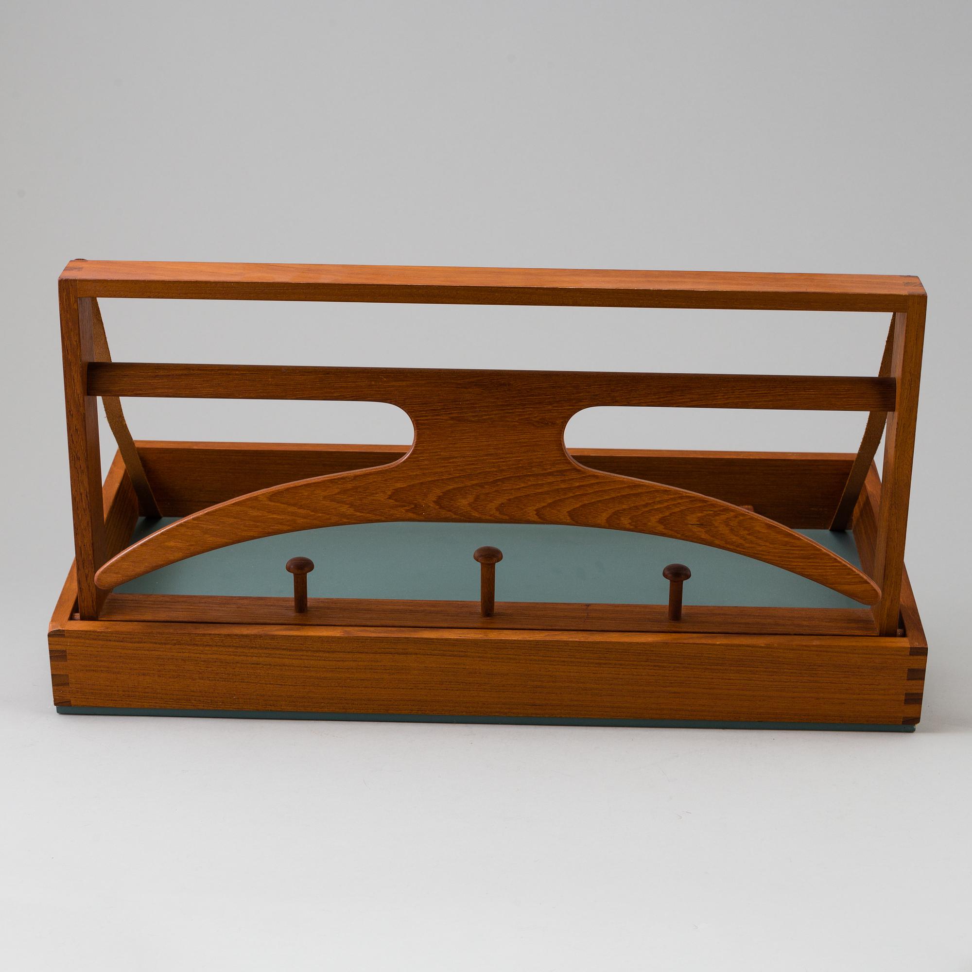 A clothes hanger by Adam Hoff & Poul Östergaard, Virum Möbelsnickeri, Denmark, mid 20th century.