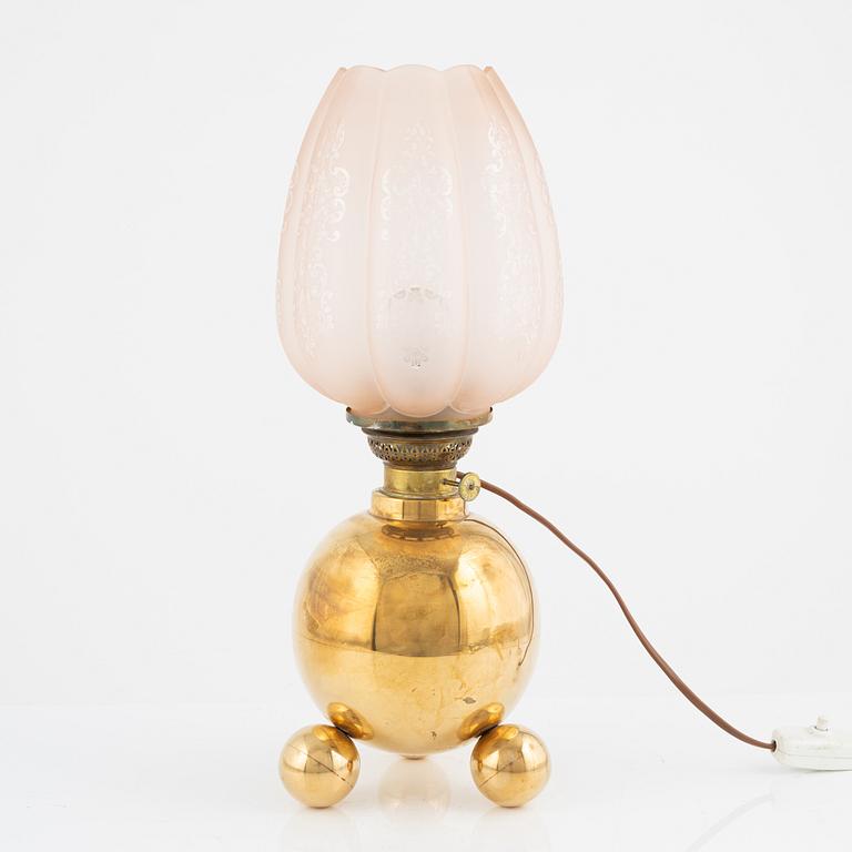 A brass and glass table light, Gusum, first half of the 20th Century.