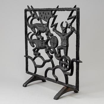 A cast iron fire shield by Olle Hermansson, Husqvarna.