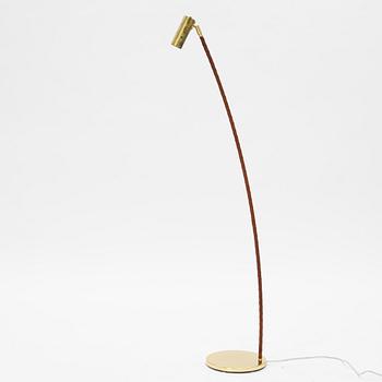 A brass floor lamp from Örsjö.