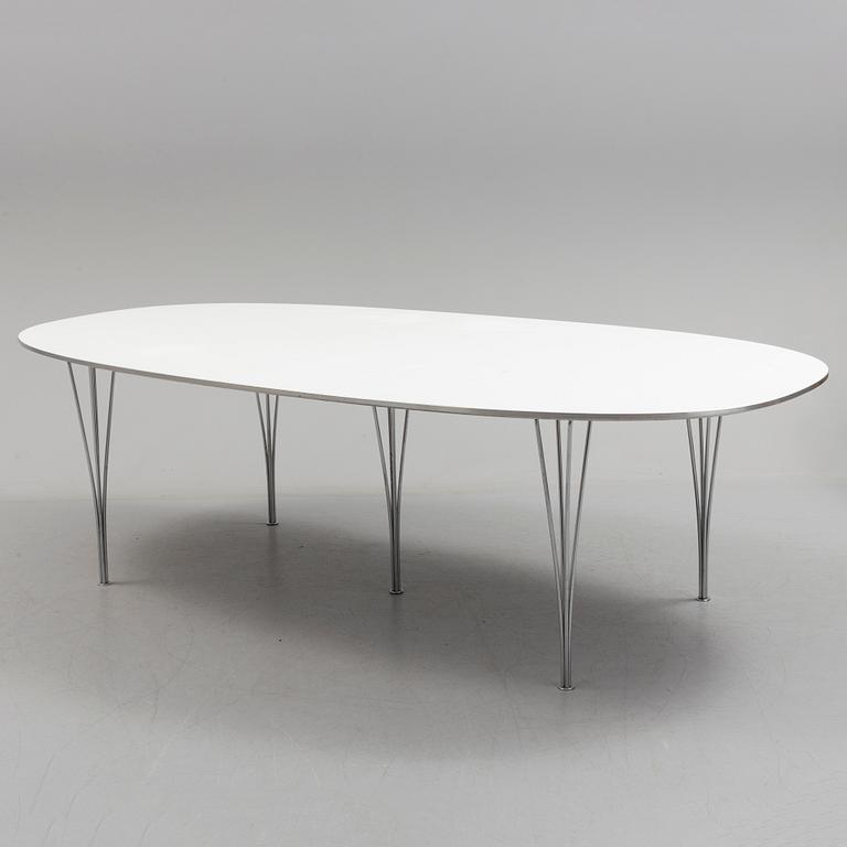 A "Superellips" table by Bruno Mathsson and Piet Hein for Fritz Hansen.