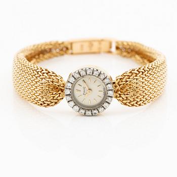 Piaget, armbandsur 18K guld och runda briljantslipade diamanter med länk av W.A. Bolin.