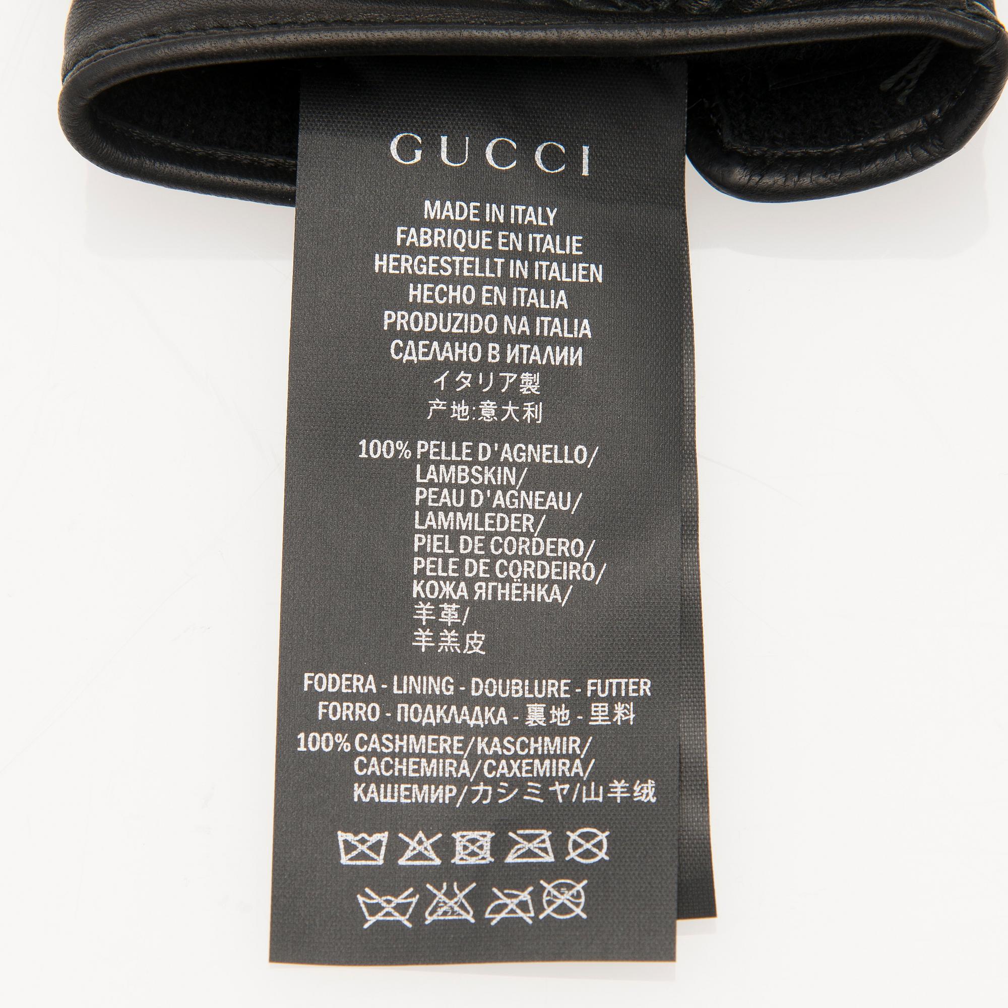 A pair of Gucci ladies' leather gloves.