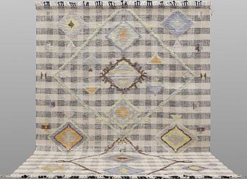 A kilim carpet with relief, 361 x 273 cm.