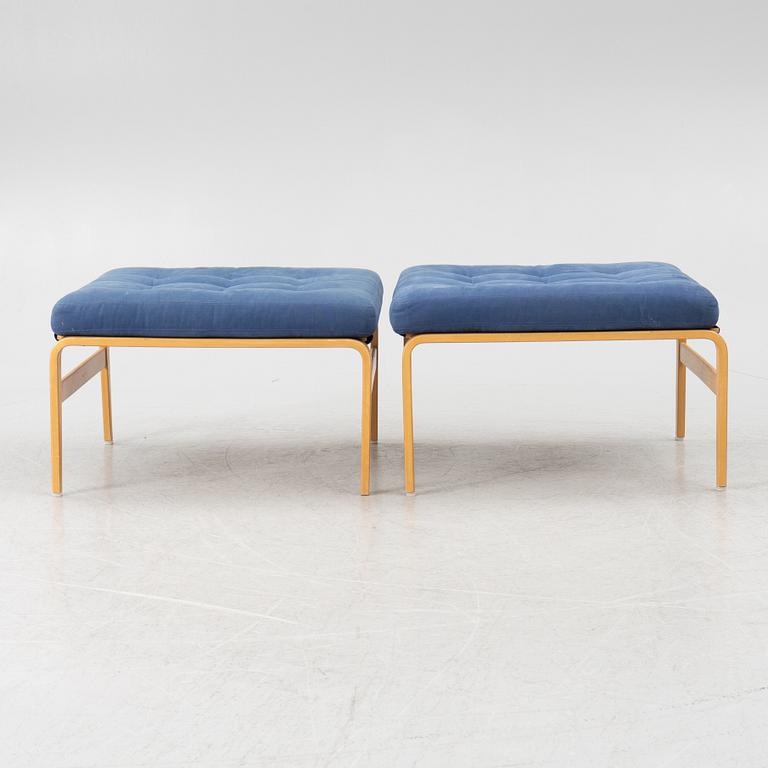 Bruno Mathsson, a pair of armchairs with ottomans, 'Ingrid', Dux, second half of the 20th century.