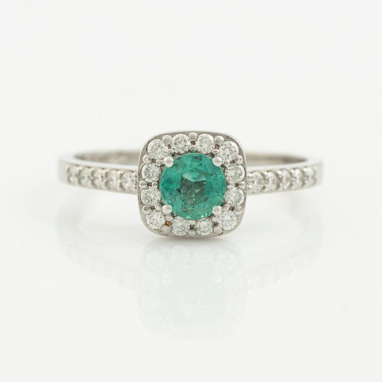 Emerald and brilliant-cut diamond ring.