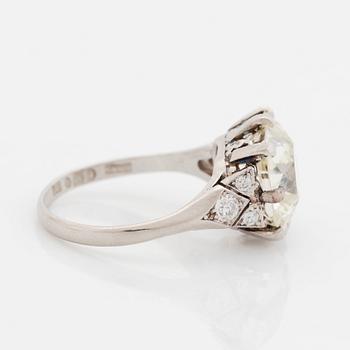 A platinum ring set with an old-cut diamond.