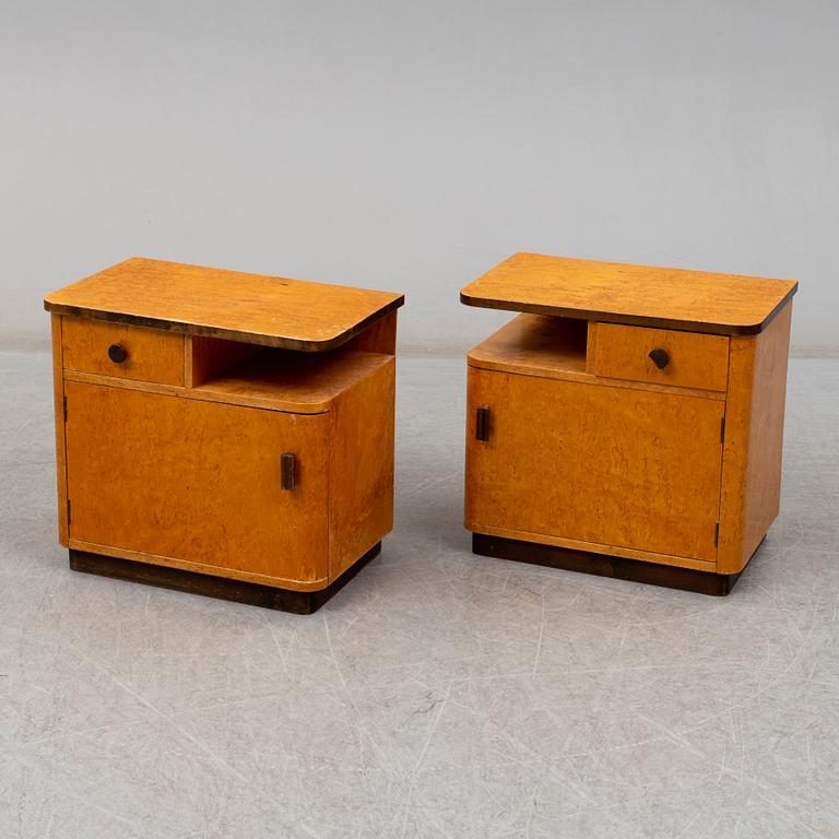 A pair of 1930/40's bedside tables.