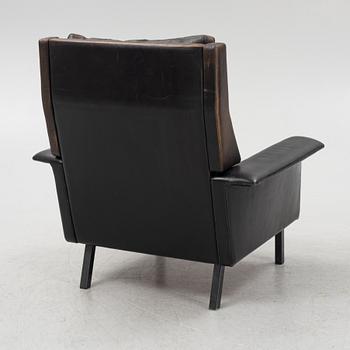 Arne Vodder, a leather armchair, Frits Hanzen, Denmark, 1966.
