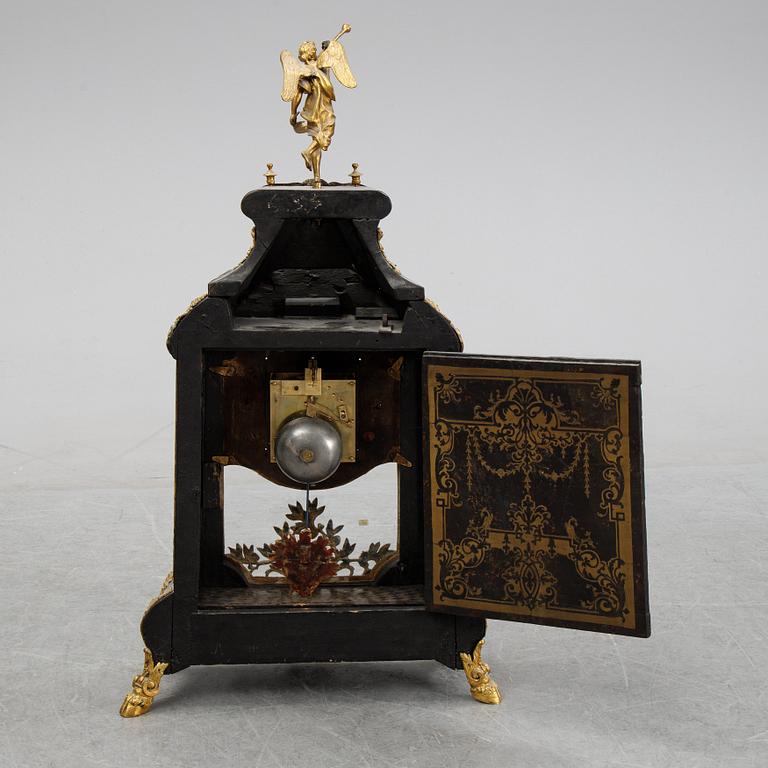 A French Louis XV style bracket clock, 19th centuty.