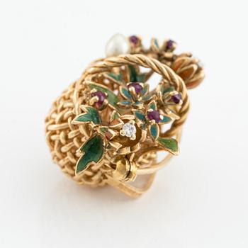 A basket brooch in 18K gold and enamel with diamonds designed by Barbro Littmarck, W.A. Bolin Stockholm 1950.