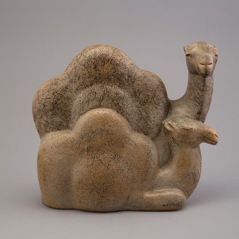 LISA LARSON, a stoneware figurine.