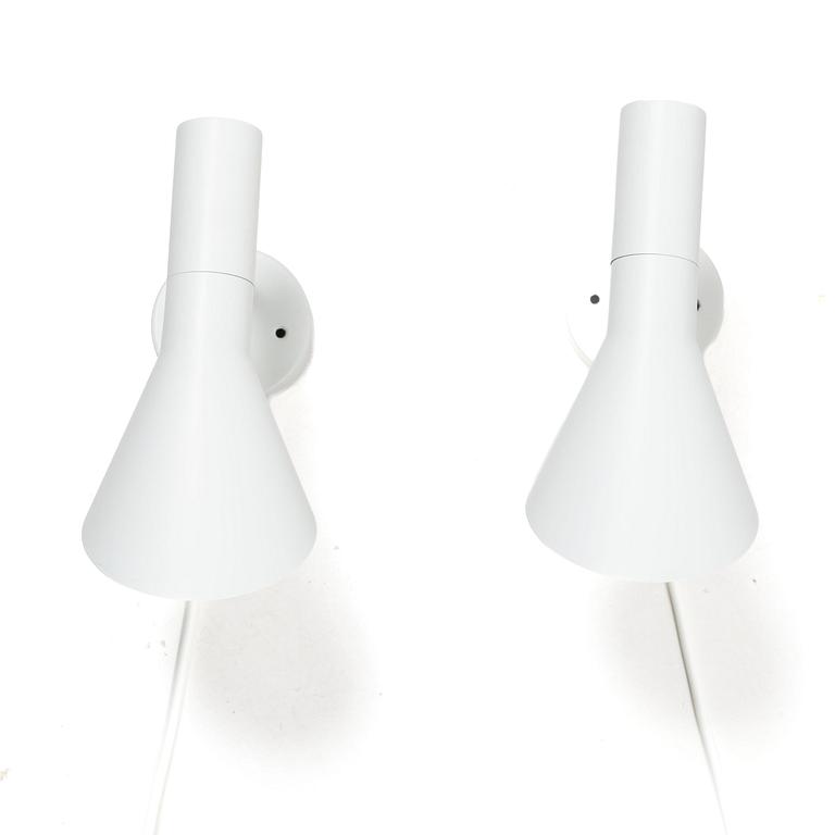 Arne Jacobsen, Wall lights/bedside lights, a pair, “AJ”, Louis Poulsen, Denmark.