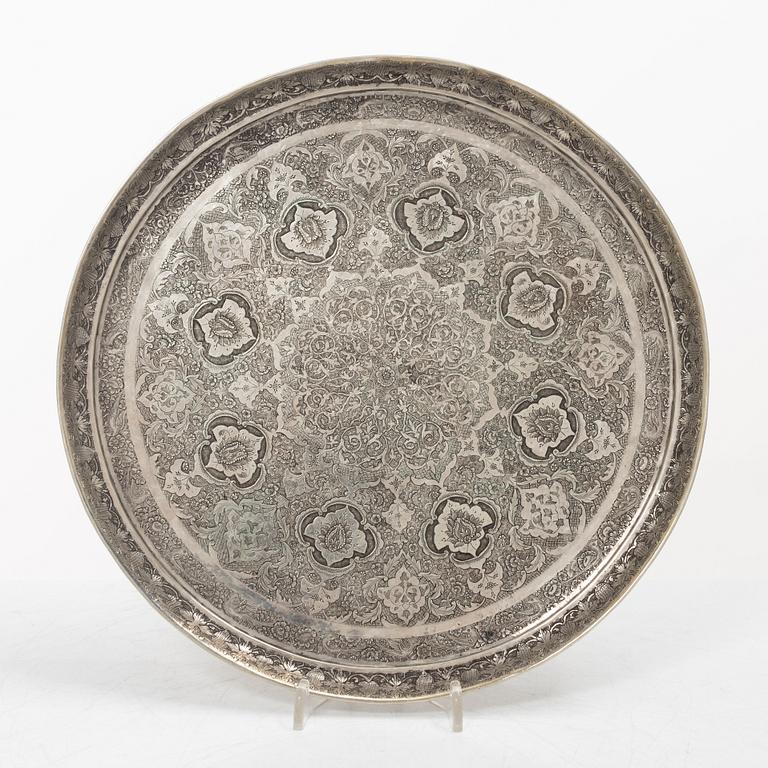 A Persian silver tray, 12 small spoons and six coasters, first part of the 1900s.