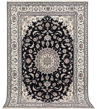 A carpet, Nain, part silk, ca 307 x 198 cm.