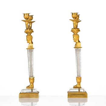 A pair of Empire ormolu and cut glass two-branch candelabra, Paris, early 19th century.