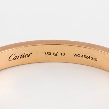 A Cartier 'LOVE' bangle set with round, brilliant-cut diamonds.