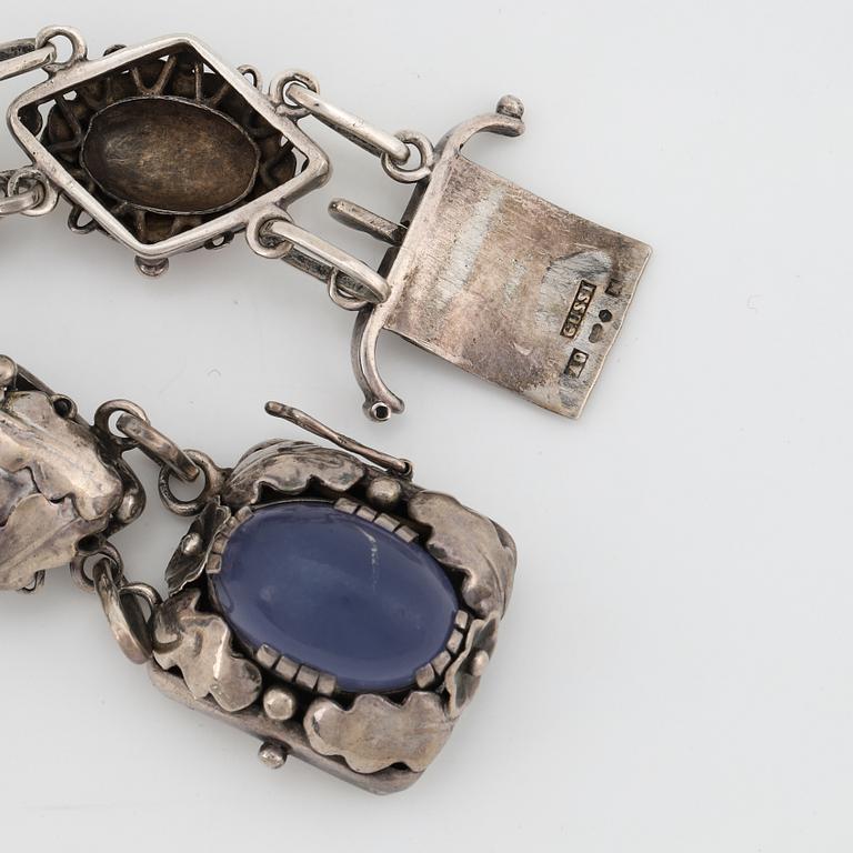 Bracelet, silver and cabochonslipade blue chalcedony, Gussi Smycken AB, Malmö, 1951.