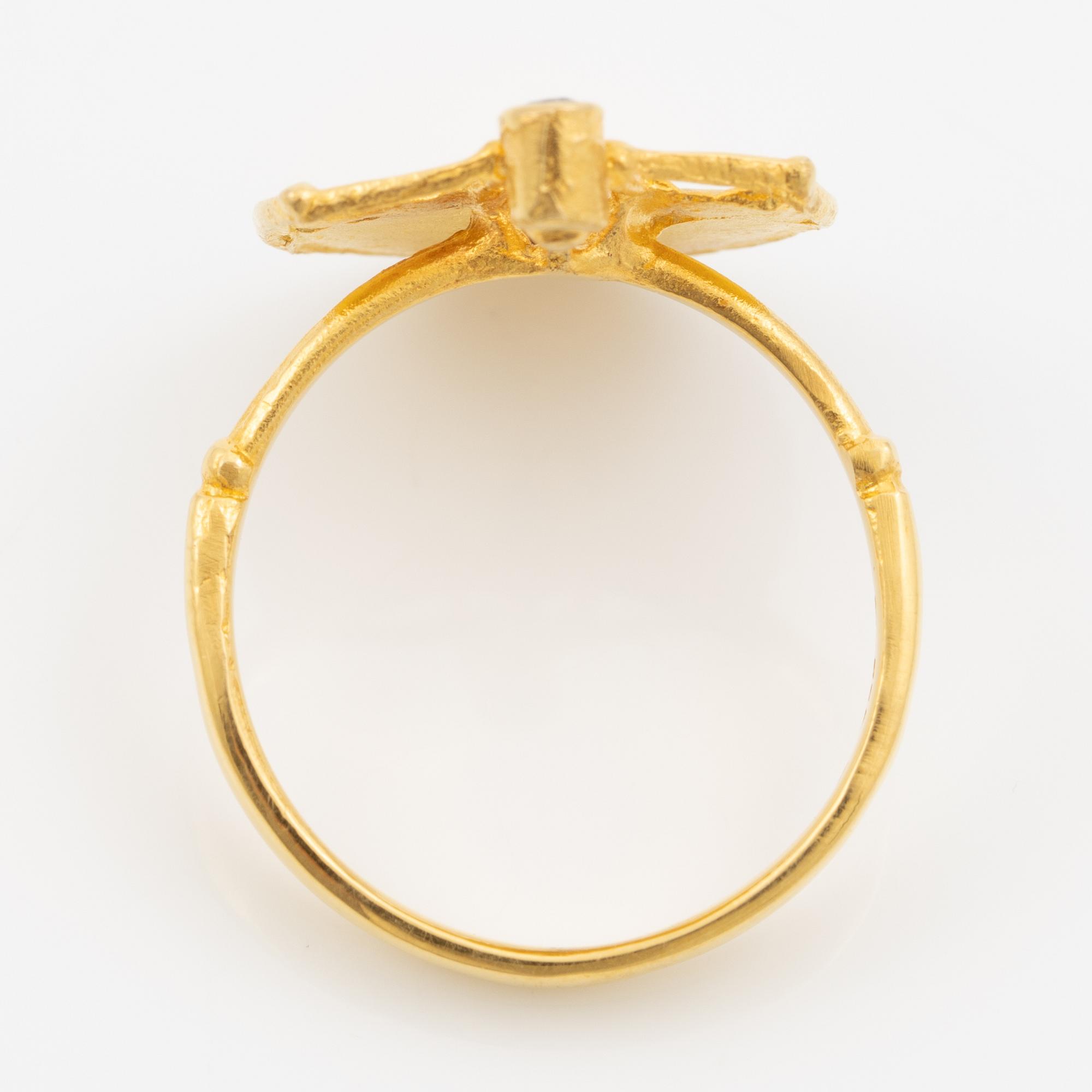 Ring, 18K guld med en rund briljantslipad diamant.