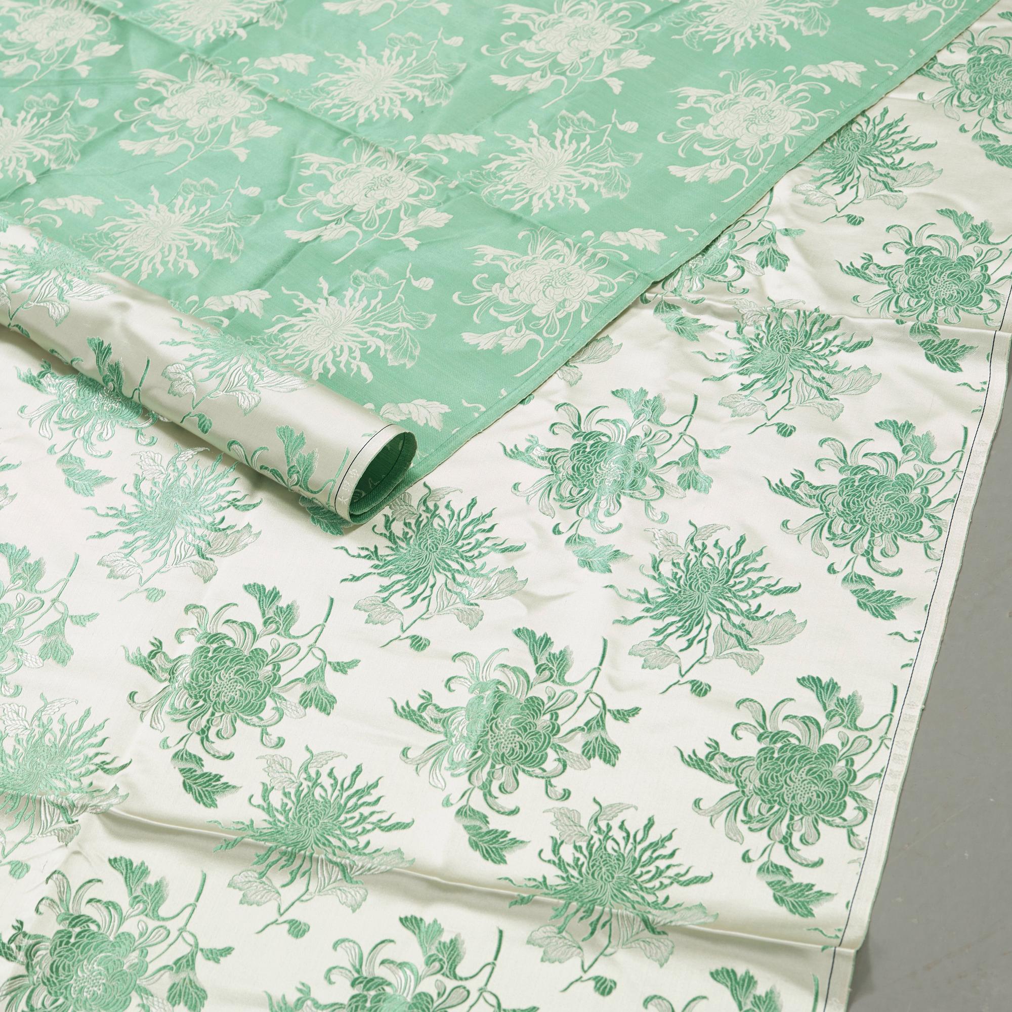 Three Chinese silk fabric rolls. 341,5 x 69 cm, 899 x 68 cm and 1290 x 68,5 cm.