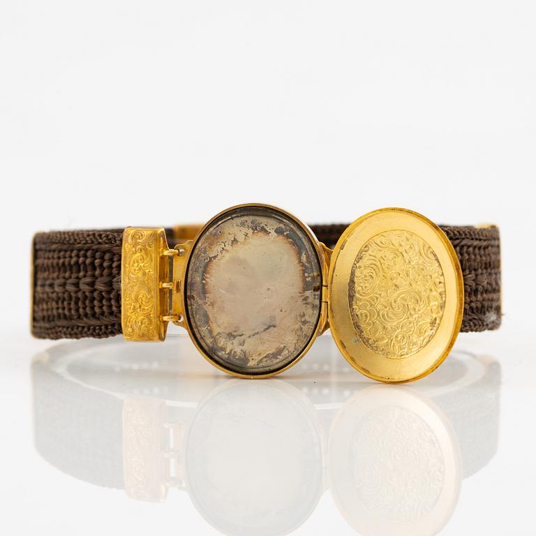 Armband hårarbete och 14K guld.