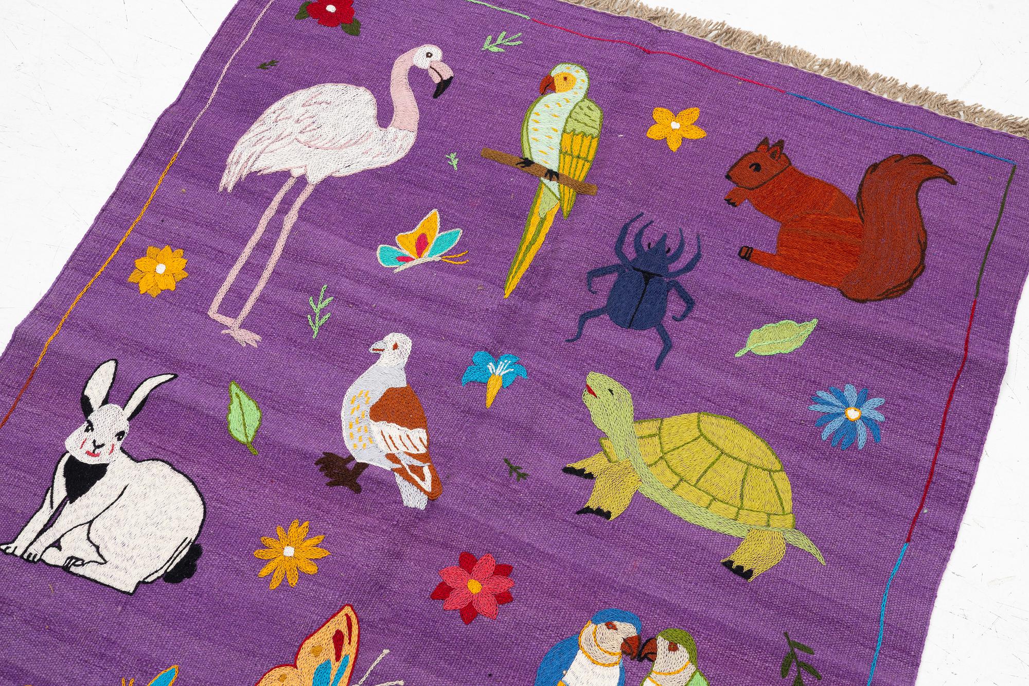 A hand-embroidered Kelim rug, c. 177 x 123 cm.