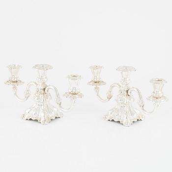 A pair of Baroque style candelabras, early 20th Century.