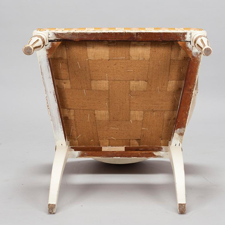 A late Gustavian style armchair, circa 1830.