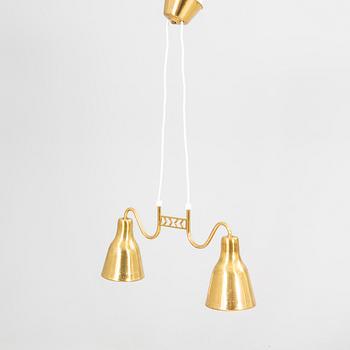 Taklampa 1900-talets mitt.