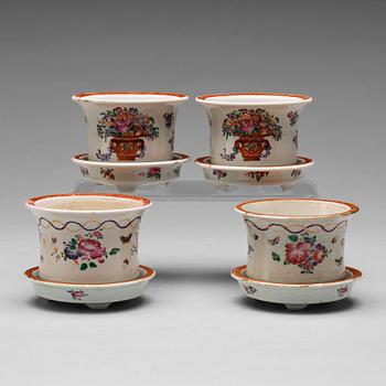 A set of four (2+2) famille rose flower pots with stands, Qing dynasty, Qianlong (1736-95).