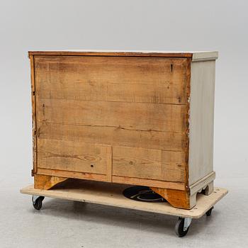 A painted chest of drawers, end of the 19th Century.